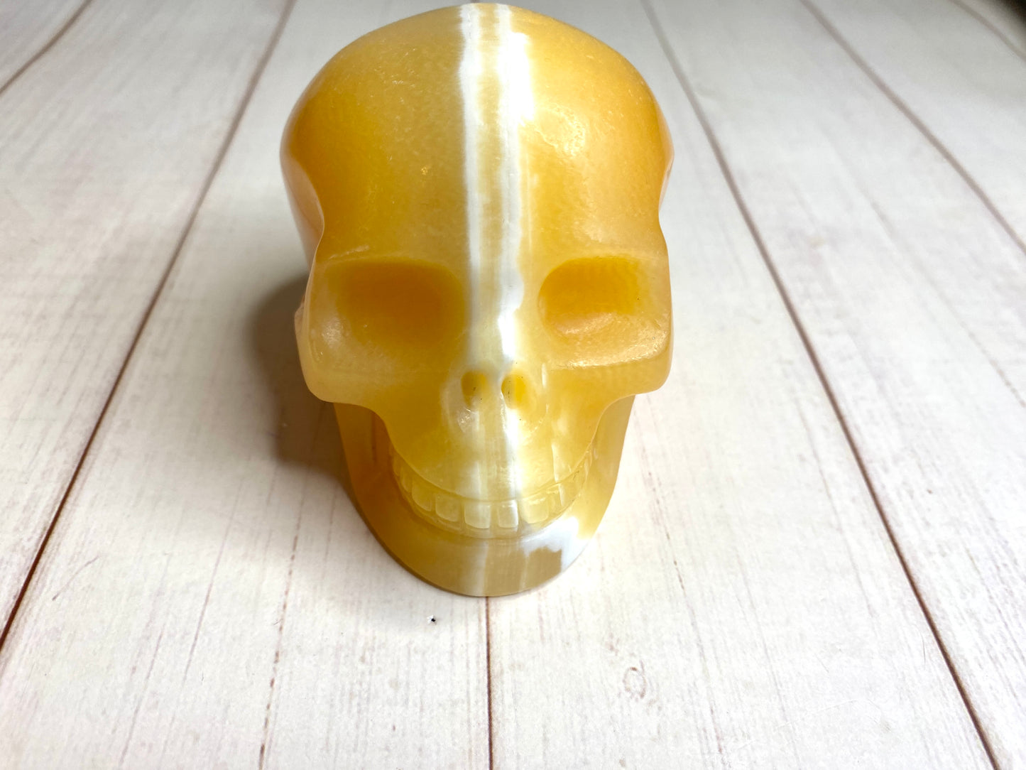 Orange Calcite Skull Carving